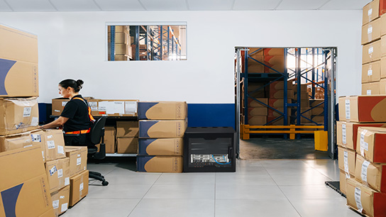 Employee working in stock room